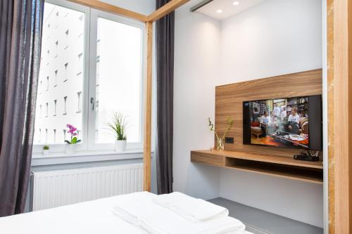 Foto Rooms and Apartments Glossy 5