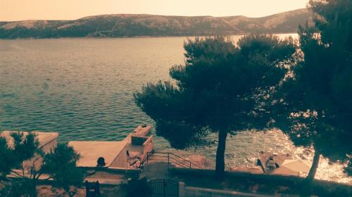 a view of a large body of water at Sea breeze Apartments with boat Anchorage in Stara Novalja