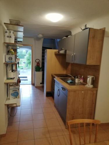 a kitchen with a sink and a counter top at Amtmannhaus Ferienunterkunft in Irdning