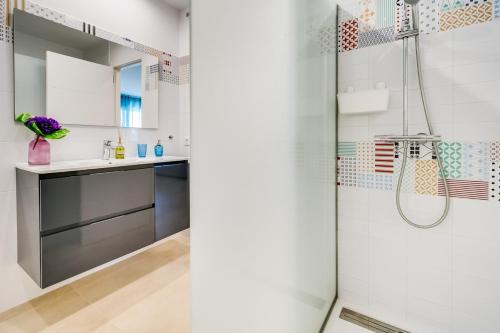 a bathroom with a shower and a sink at Vivalidays Josep in Blanes