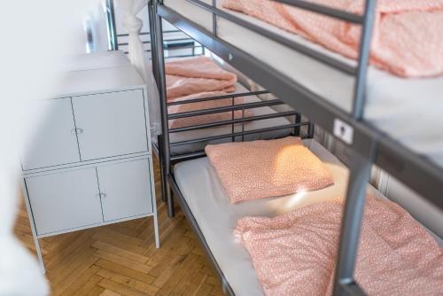 Postel nebo postele na pokoji v ubytování Avenue Hostel