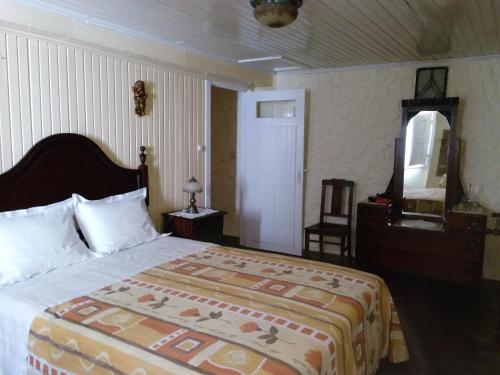 Ένα ή περισσότερα κρεβάτια σε δωμάτιο στο Casas do Durão-Memories House