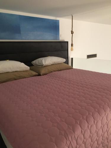 Кровать или кровати в номере Balkon Apartman Horváth Ház Balatonfüred