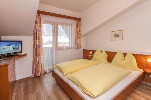 Postel nebo postele na pokoji v ubytování Pension Christophorus