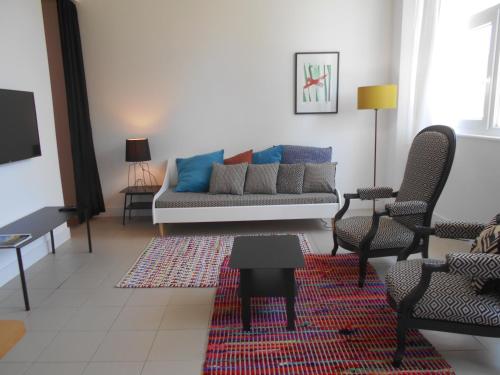 Χώρος καθιστικού στο Maison d'Hotes Les Palmiers