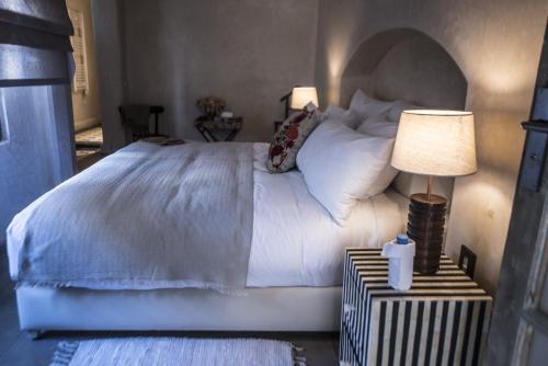 Cama ou camas em um quarto em Dar Mayshad