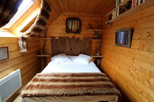 Ένα ή περισσότερα κρεβάτια σε δωμάτιο στο Tal ar galonn