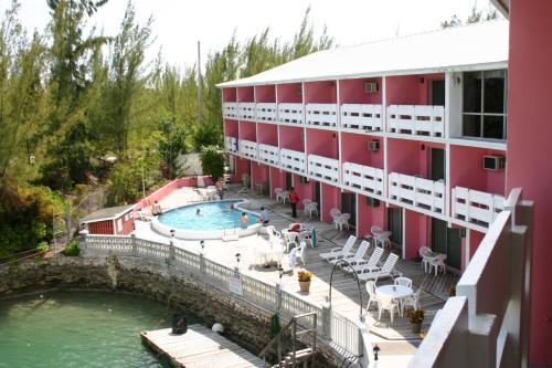 a view of a hotel with a swimming pool at Bell Channel Inn Hotel in Freeport