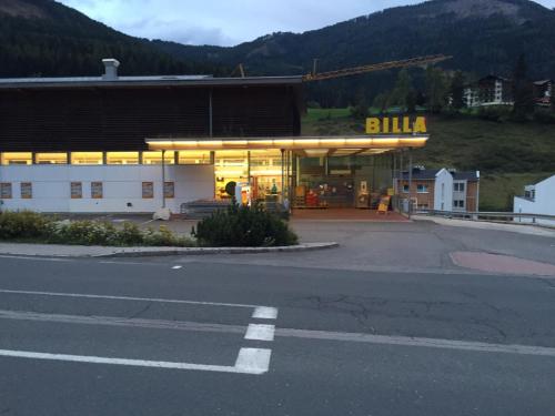 a building with a bill sign in front of it at House Arianna in Bad Kleinkirchheim