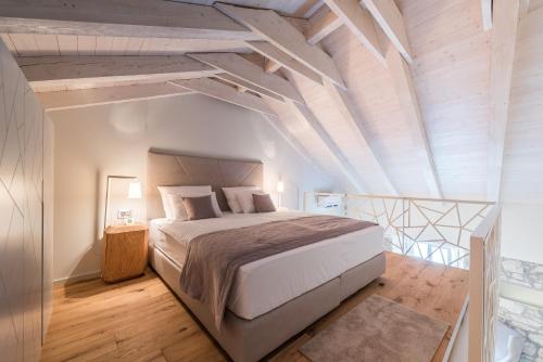 Posteľ alebo postele v izbe v ubytovaní Alma Lofts