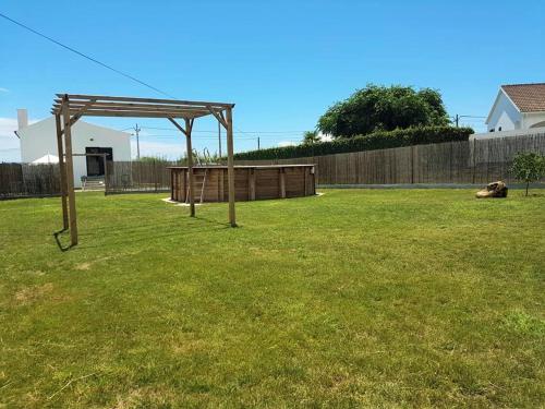 a gazebo in the middle of a yard at Refúgio in Horta