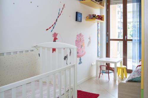 Posteľ alebo postele v izbe v ubytovaní Fellini - Family Flat