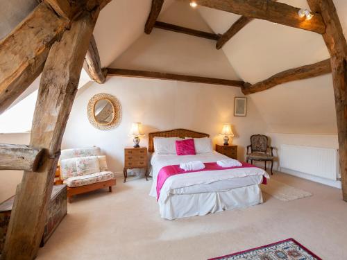 Katil atau katil-katil dalam bilik di Pilgrim Cottage
