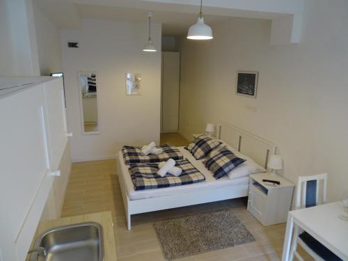 Posteľ alebo postele v izbe v ubytovaní Job studio apartments