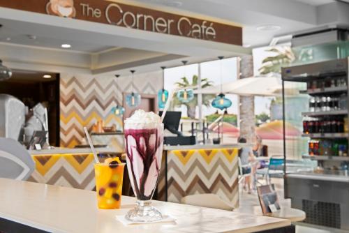 a drink sitting on a counter in a restaurant at Gran Tacande Wellness & Relax Costa Adeje in Adeje