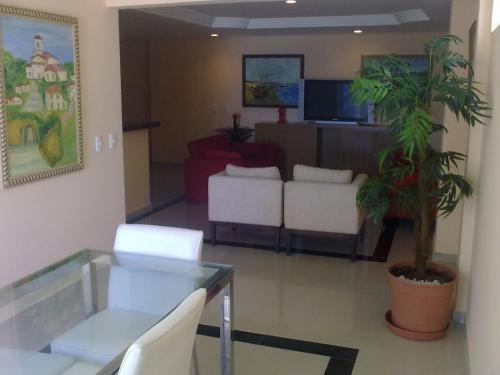 Un lugar para sentarse en Don Limpone Apart Hotel