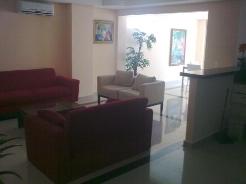 Un lugar para sentarse en Don Limpone Apart Hotel