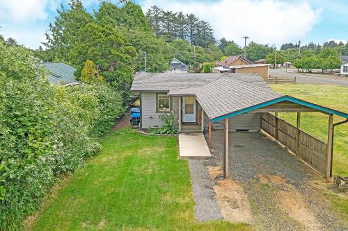 an overhead view of a small house with a roof at Crabbin Cabin - You Won't Be Crabby After Staying Here! in Westport