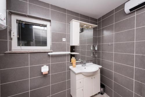 Koupelna v ubytování Apartman Sigurnjak