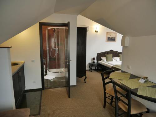 En eller flere senge i et værelse på Sibiu City Center Apartments