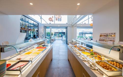 a buffet line with many different types of food at Protaras Plaza Hotel in Protaras