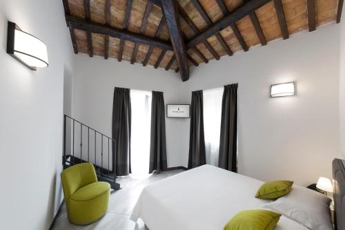 Postel nebo postele na pokoji v ubytování Interamnia Boutique Hotel