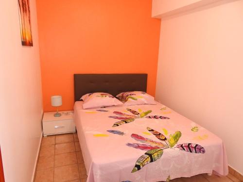 Katil atau katil-katil dalam bilik di gîte CITRONNELLE