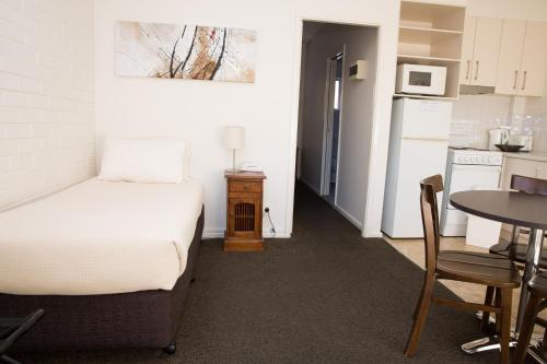 Kuchyň nebo kuchyňský kout v ubytování Centralpoint Motel