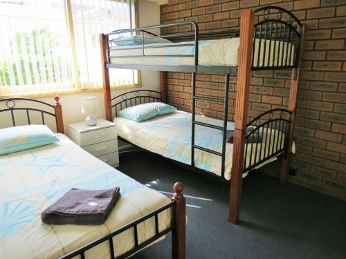 A bunk bed or bunk beds in a room at Chapman Court