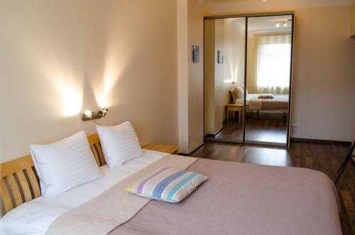 Katil atau katil-katil dalam bilik di City Inn Riga Apartment Old Town Home with parking