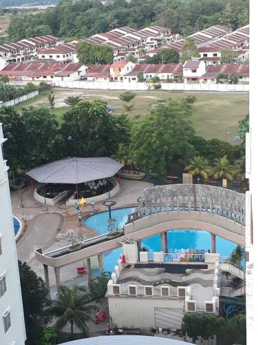 an aerial view of a resort with a swimming pool at Junikastay BLagoon Melaka in Melaka