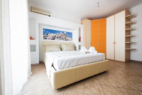 Postel nebo postele na pokoji v ubytování B&B Li Tarici