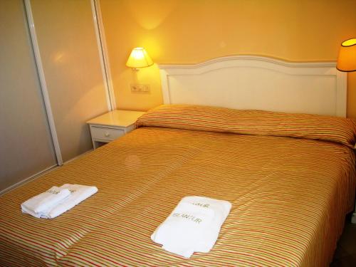 Letto o letti in una camera di Islantur Las Américas