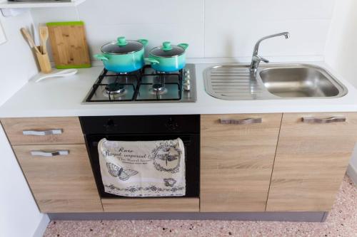 Dapur atau dapur kecil di Forte apartments "Enjoy Salento"