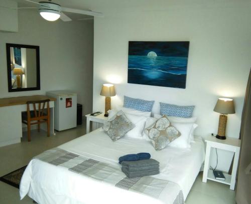 Katil atau katil-katil dalam bilik di Beach House