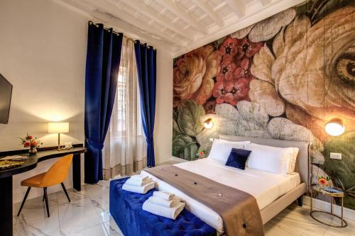 a hotel room with a bed and a wall mural at Little Queen Pantheon in Rome