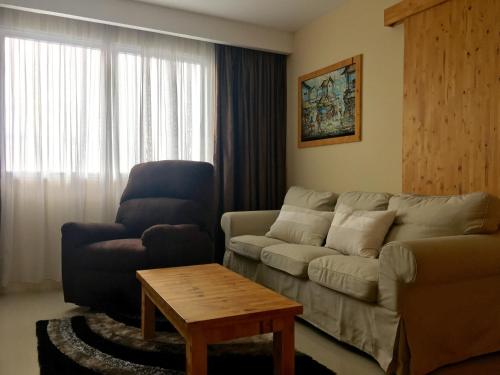 Un lugar para sentarse en Nagoya Mansion Apartment