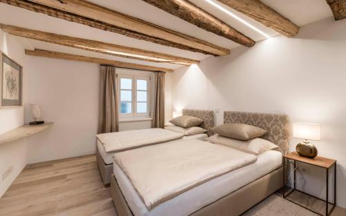 Кровать или кровати в номере Apartment Valentina