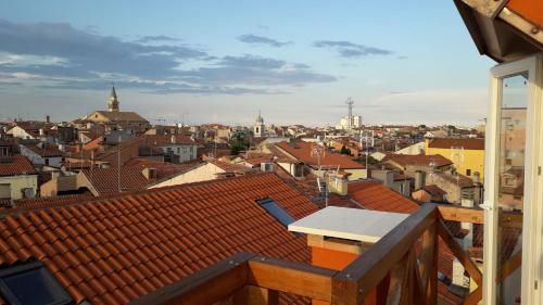 a view of a city from the roof of a building at Mansarda Settimo Cielo in Chioggia