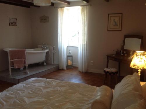 Postel nebo postele na pokoji v ubytování Lemonie Farmhouse