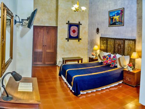Ένα ή περισσότερα κρεβάτια σε δωμάτιο στο Hotel Convento Santa Catalina by AHS