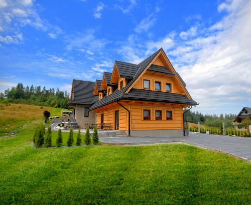 Fotografia z galérie ubytovania Domki Nad Potokiem v destinácii Murzasichle