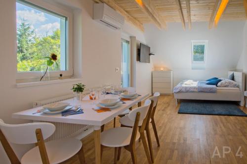 Katil atau katil-katil dalam bilik di Apartments Perla