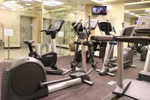 a gym with a bunch of exercise bikes in it at Hotel Biltmore in Guatemala