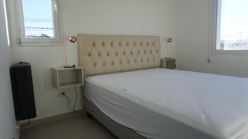 Ένα ή περισσότερα κρεβάτια σε δωμάτιο στο Barrancas Al Mar