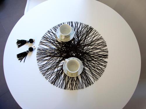 a white table with two cups on top of it at Porta Piccola Residence in Castellaneta