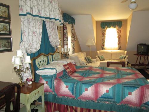 a bedroom with a large bed in a room at Oceanhillside B&B in Digby