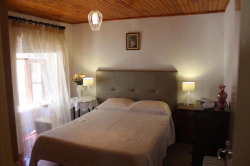 Katil atau katil-katil dalam bilik di Casa Cimo Vila