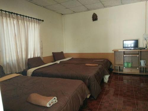 Postel nebo postele na pokoji v ubytování Bansuan Inthanon Resort