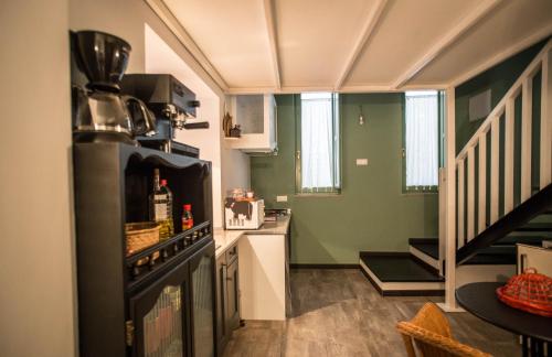 Kuchyň nebo kuchyňský kout v ubytování Casa de Abaixo